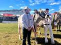 Judge Henry Bevan, Ravenshoe, QLD, with Craig Cochrane, Parrabel Genetics, and senior champion female and winner of best senior udder, Tandara Vivid Lunda 260.