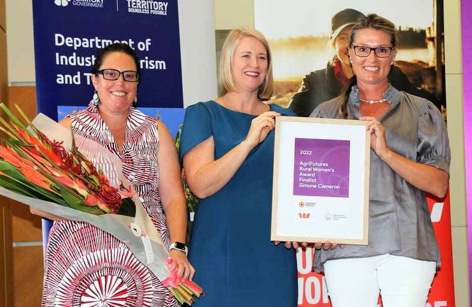 Simone Cameron (right) accepting an award for being a finalist in the AgriFutures Rural Womens Award for 2022 with Industry Minister Nicole Manison and winner Donna Digby. Picture: Supplied