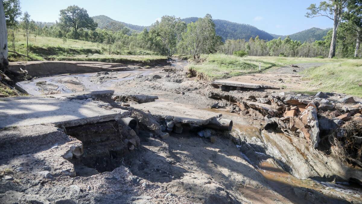 WASHED OUT: Queensland's road network was severely damaged as a result of the floods earlier in the year. Photo: Lucy Kinbacher. WASHED OUT: Queensland's road network was severely damaged as a result of the floods earlier in the year. Photo: Lucy Kinbacher.