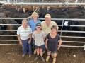 FAMILY: Bill Williams with grandchildren, Mitchel and Jack Walters, with parents Scott Walters and Katie Williams, both selling cattle at Euroa weaner sale. 
