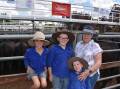 LAST SALE: Margaret Shea, Barfold Beef, was attending her last physical sale, after more than 60 years. She started going to sales as a child. She was with grandsons Charlie, seven, Jasper, 10 and Riley, four. "Going to Newmarket was a school holiday treat," Ms Shea said.