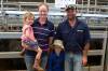 Mark and Christie Taprell, Thologolong, with children Luke and Ruby, were potential buyers, but their chosen pens sold too well, and they went away empty handed.