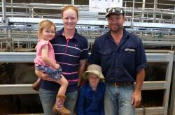 Mark and Christie Taprell, Thologolong, with children Luke and Ruby, were potential buyers, but their chosen pens sold too well, and they went away empty handed.