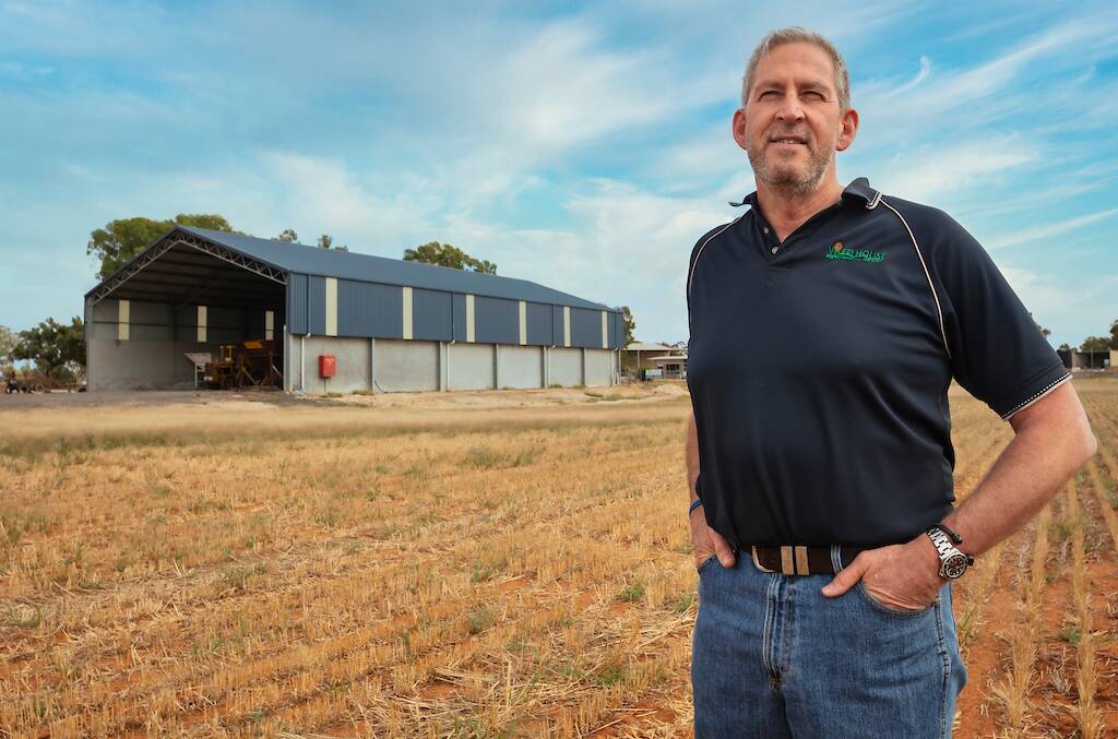 Shed advantage: The Wheelhouse Group's Wes Wheelhouse in front of his 3000 tonne fertiliser shed in Bridgewater, says the extra cost of a pre-cast wall and getting the correct pitch height are important considerations when designing a shed.