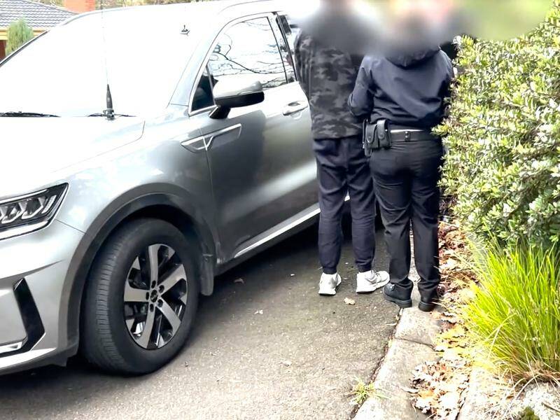A doctor was arrested a second time as part of a probe into a hidden device in a staff toilet. Photo: HANDOUT/VICTORIA POLICE