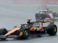 Australia's Oscar Piastri drives through the rain before the red flag came out at the Belgian GP.  Photo: EPA PHOTO