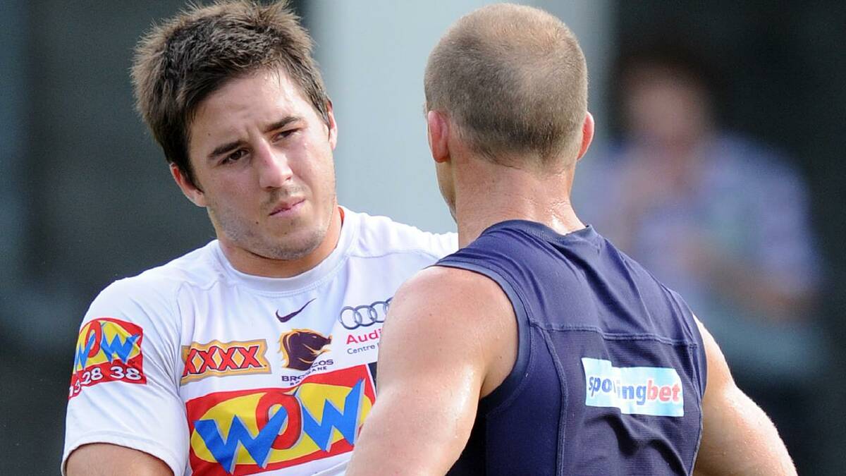 A young Ben Hunt chats with Darren Lockyer in his early days at the Broncos in 2010. (Dave Hunt/AAP PHOTOS) A young Ben Hunt chats with Darren Lockyer in his early days at the Broncos in 2010. (Dave Hunt/AAP PHOTOS)