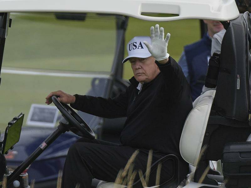 Donald Trump was spotted playing golf at one of his Scottish properties ahead of official meetings. Photo: AP PHOTO Donald Trump was spotted playing golf at one of his Scottish properties ahead of official meetings. Photo: AP PHOTO