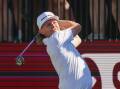 Cam Smith tees off during LIV Golf's Adelaide tournament last February. Photo: Matt Turner/AAP PHOTOS