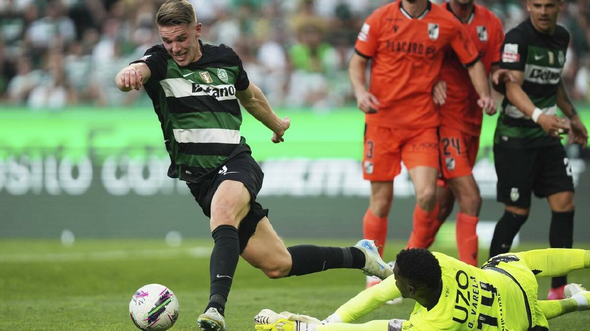 Viktor Gyokeres rounds the Vitoria goalkeeper to score during a Portuguese league match. (AP PHOTO) Viktor Gyokeres rounds the Vitoria goalkeeper to score during a Portuguese league match. (AP PHOTO)