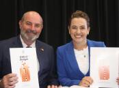 Chief Minister Lia Finocchiaro and Treasurer Bill Yan are pouring millions into crime fighting. Photo: Lloyd Jones/AAP PHOTOS