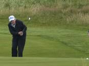 President Donald Trump is combining golf with political meetings on his trip to Scotland. Photo: AP PHOTO
