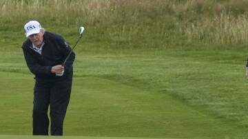 President Donald Trump is combining golf with political meetings on his trip to Scotland. Photo: AP PHOTO