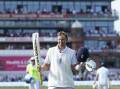 England's Joe Root departs acknowledging the Old Trafford fans after his stunning 150 against India. Photo: AP PHOTO