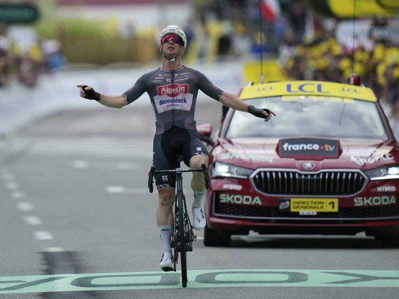 Australia's Kaden Groves crosses the finish line to win the penultimate stage of the Tour de France. Photo: AP PHOTO Australia's Kaden Groves crosses the finish line to win the penultimate stage of the Tour de France. Photo: AP PHOTO