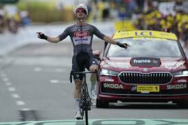 Australia's Kaden Groves crosses the finish line to win the penultimate stage of the Tour de France. Photo: AP PHOTO