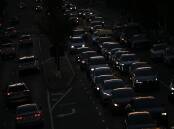 The IMF expects a severe hit to the global economy if the war drags on and oil hits $US125 a barrel. Photo: Joel Carrett/AAP PHOTOS