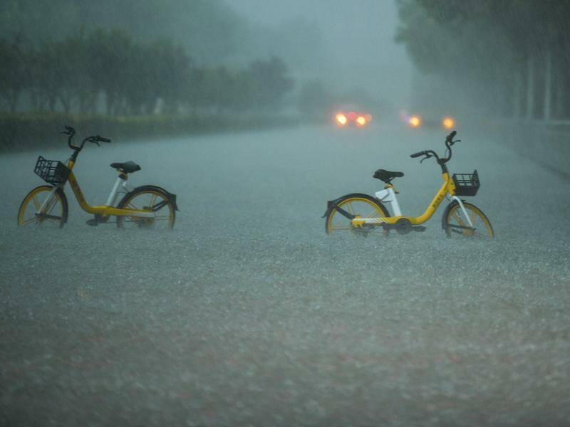 Flash flooding washed away 19 houses in areas near the Chinese city of Jinan. Photo: AP PHOTO Flash flooding washed away 19 houses in areas near the Chinese city of Jinan. Photo: AP PHOTO