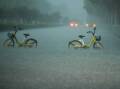 Flash flooding washed away 19 houses in areas near the Chinese city of Jinan. Photo: AP PHOTO