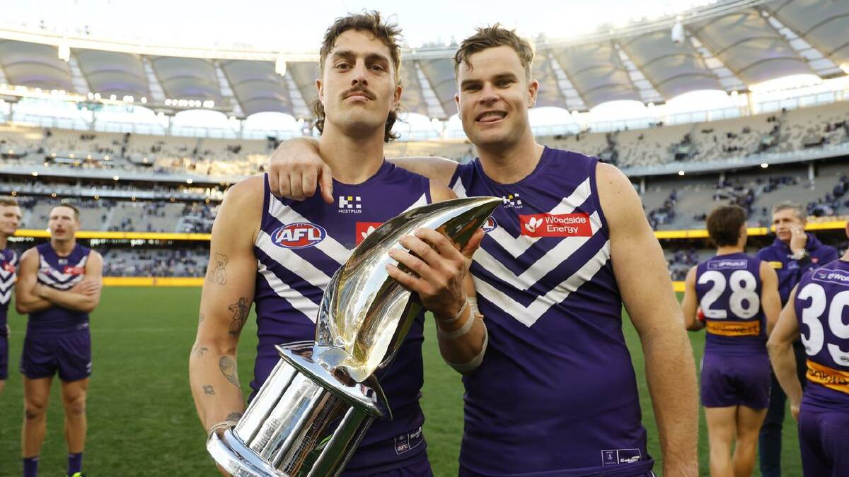 To the victors go the spoils, the Dockers get to hold the Derby Trophy. (James Worsfold/AAP PHOTOS) To the victors go the spoils, the Dockers get to hold the Derby Trophy. (James Worsfold/AAP PHOTOS)