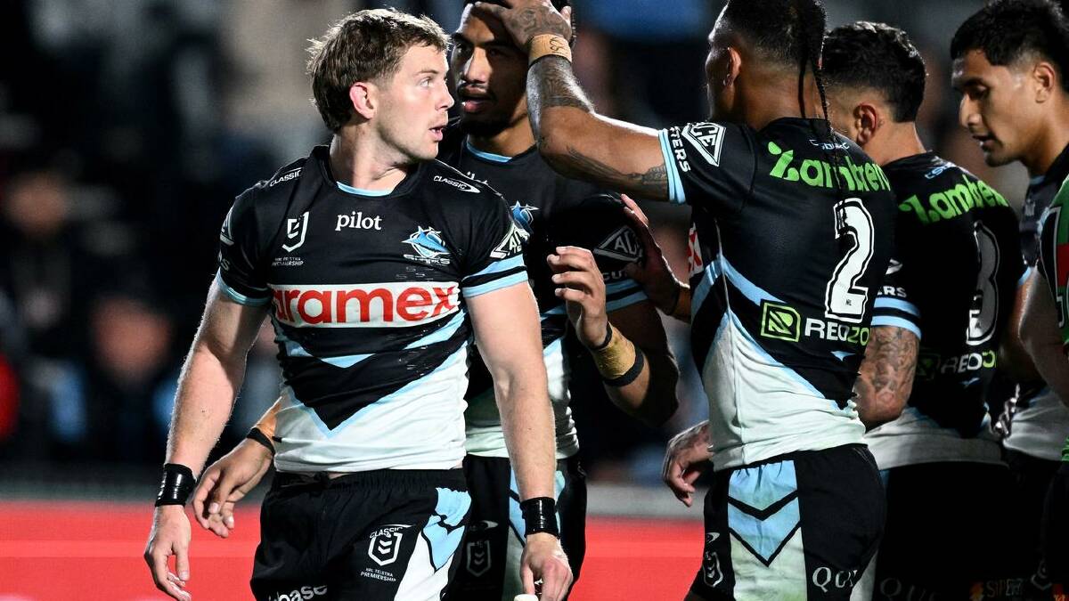 A try to Blayke Brailey (left) helped the Sharks chalk up their third straight victory.  (Dan Himbrechts/AAP PHOTOS)