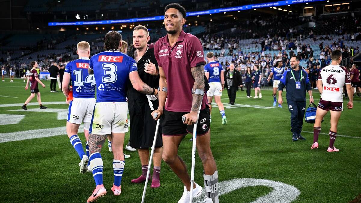 Jason Saab hobbles off Accor Stadium with the aid of crutches late last season. (Dan Himbrechts/AAP PHOTOS)