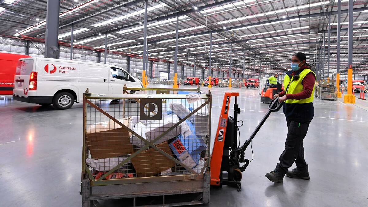 Online spending has picked up with talk of interest rate cuts and inflation easing. (James Ross/AAP PHOTOS)