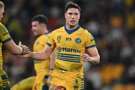 Parramatta captain Mitchell Moses celebrates the 22-20 win over Brisbane after returning from injury Photo: Dave Hunt/AAP PHOTOS
