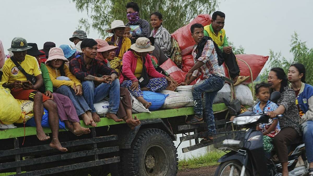 Towns on both sides of the long-disputed border are being emptied as civilians flee the clashes. (AP PHOTO)