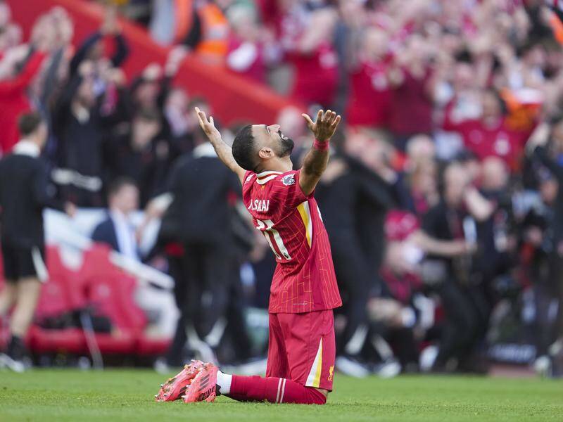 Liverpool's Mohamed Salah celebrates after they lifted England's Premier League title. Photo: AP PHOTO Liverpool's Mohamed Salah celebrates after they lifted England's Premier League title. Photo: AP PHOTO