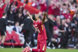 Liverpool's Mohamed Salah celebrates after they lifted England's Premier League title. Photo: AP PHOTO