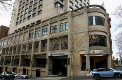 A woman is recovering in hospital and another will face court following a stabbing at a city hotel. Photo: Bianca De Marchi/AAP PHOTOS