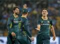Ben Dwarshuis (right) was player of the match for his three wickets in the final T20I.  Photo: AP PHOTO