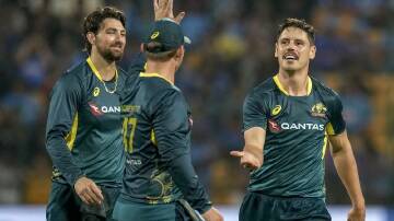 Ben Dwarshuis (right) was player of the match for his three wickets in the final T20I.  Photo: AP PHOTO