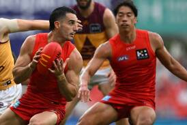 Brayden Fiorini and Alex Davies are evidence of Gold Coast's much-improved depth. Photo: Dave Hunt/AAP PHOTOS