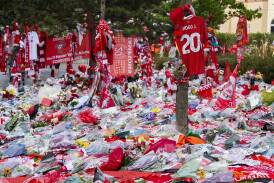 The masses of tributes left to Diogo Jota at Anfield will form the basis of a permanent memorial. Photo: EPA PHOTO