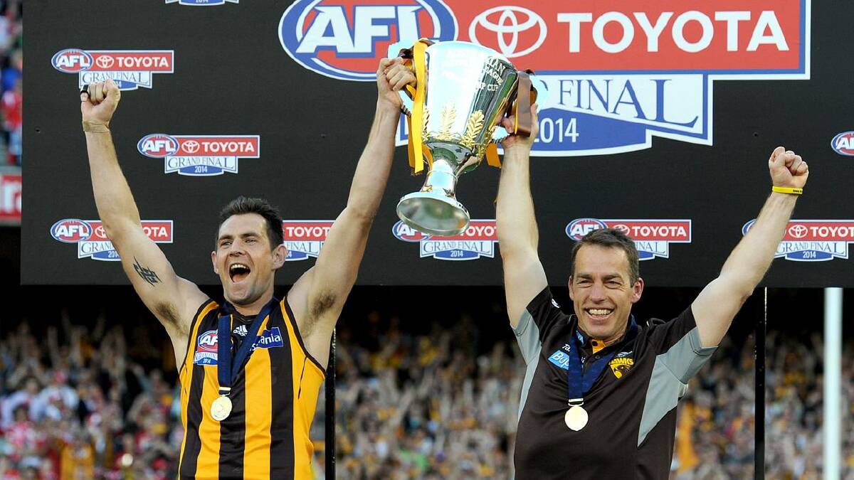 The 2014 premiership capped off a tough year for the Hawks and coach Alastair Clarkson. (Joe Castro/AAP PHOTOS)