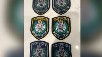A man allegedly stole 71 pieces of police uniform and insignia, and attempted to sell them. Photo: HANDOUT/NSW POLICE