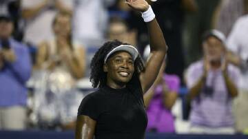 Venus Williams waves to the crowd after her loss in Washington. Photo: AP PHOTO