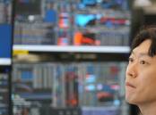Stocks in Asia are lower as the US and Iran launched new attacks in the Gulf. Photo: AP PHOTO