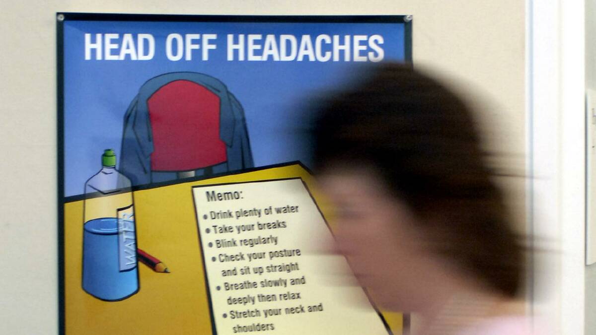 Health advocates note migraine affects women in their working lives, as well as in family life. (Alan Porritt/AAP PHOTOS)