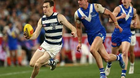 Geelong's Jeremy Cameron led North Melbourne's defenders a merry dance on his way to 11 goals. Photo: Rob Prezioso/AAP PHOTOS