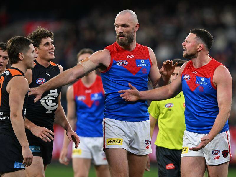 Steven May (r) has lost his challenge against a three-game suspension at the AFL Appeals Board. Photo: James Ross/AAP PHOTOS