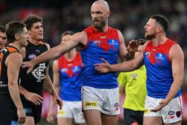 Steven May (r) has lost his challenge against a three-game suspension at the AFL Appeals Board. Photo: James Ross/AAP PHOTOS