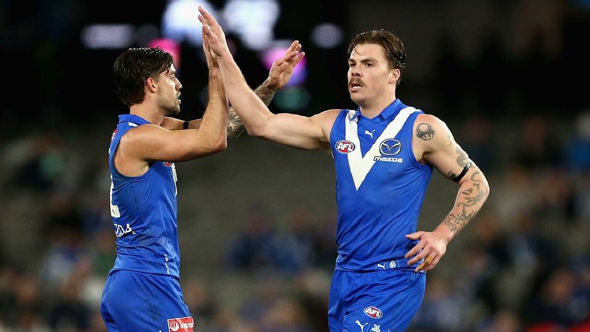 Cameron Zurhaar (right) tried hard for the Kangaroos, finishing with three goals. (Rob Prezioso/AAP PHOTOS)