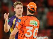Cameron Green is congratulated by his Test captain Pat Cummins after KKR's win over Hyderabad. Photo: AP PHOTO