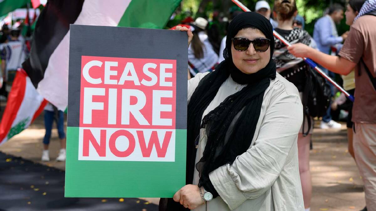 Women are trying to protect family on the ground from thousands of miles away, a researcher says. (Steven Markham/AAP PHOTOS) Women are trying to protect family on the ground from thousands of miles away, a researcher says. (Steven Markham/AAP PHOTOS)