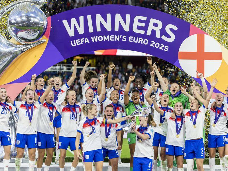 England players celebrate with the trophy after beating Spain on penalties in the Euro 2025 final. Photo: EPA PHOTO