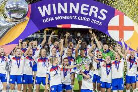 England players celebrate with the trophy after beating Spain on penalties in the Euro 2025 final. Photo: EPA PHOTO
