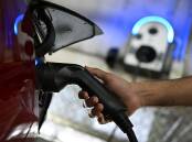 NSW plans to add more than 500 EV-charging facilities in 130 suburbs over the next 12 months. Photo: James Ross/AAP PHOTOS